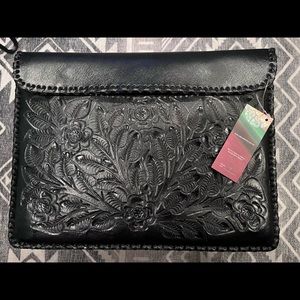 Alexis David Envelop Purse with hand tooled floral leather.